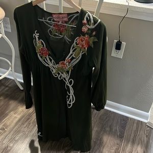 Johnny Was knee length dress.  Flower patterned around v neckline